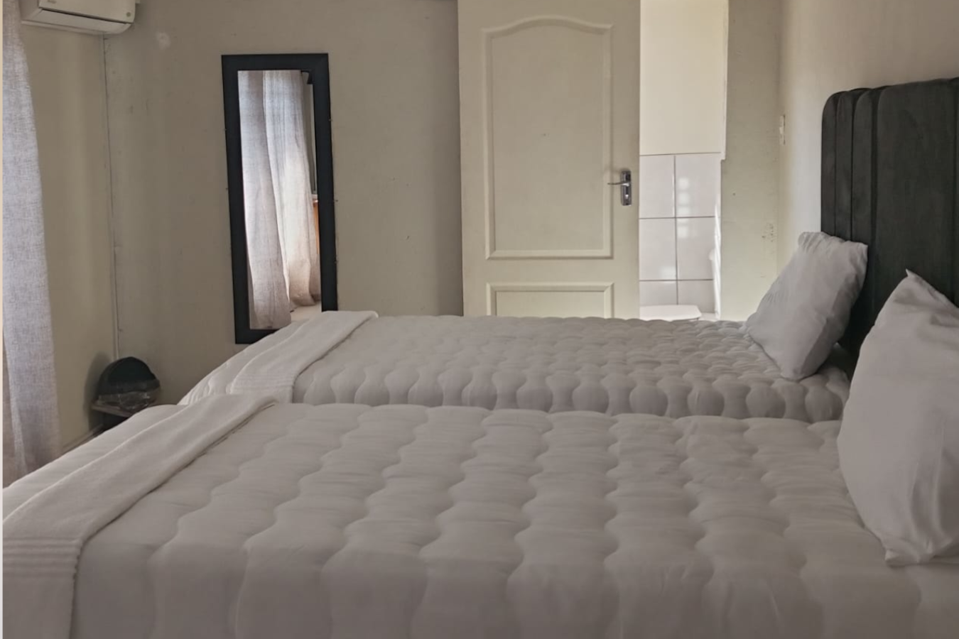 Twin/double room at Elite Stay Guest House Rustenburg - single bed with shower